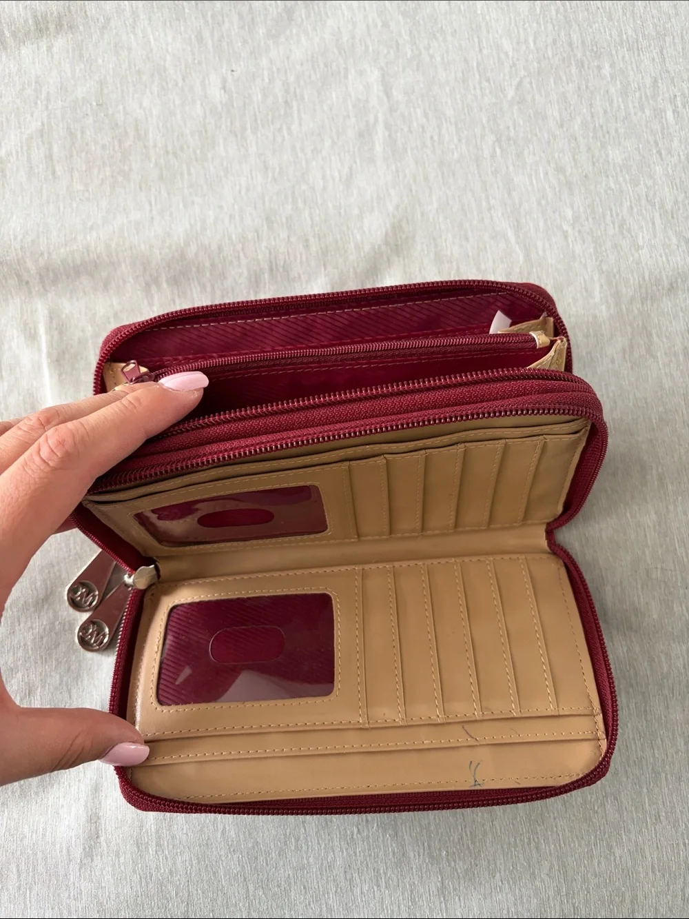 Red Embossed Zip-Around Wallet with Ornate Medallion Accent